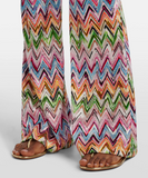 Flared pants with lace pattern and zigzag motif