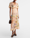 Long dress with placed flora and fauna print